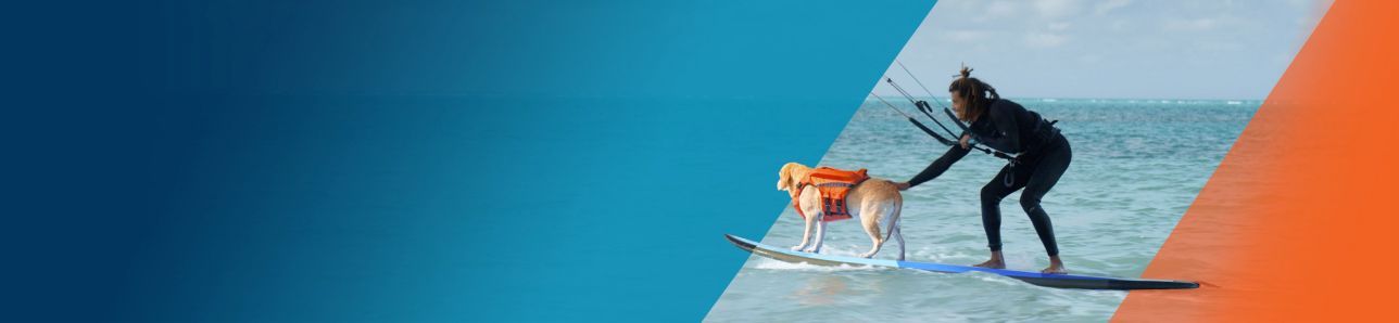 Potential OPDIVO® (nivolumab) user wakesurfing with his dog.